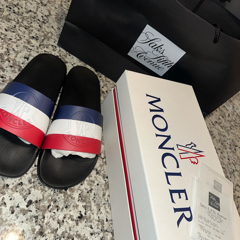 100% Authentic Moncler Basile Logo- Embossed Striped Rubber Slides